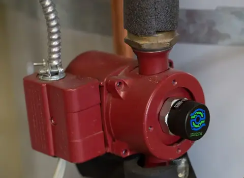 A wireless sensor on an industrial electric motor for vibration monitoring