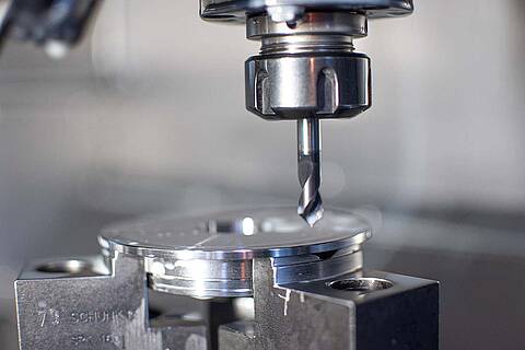 Close-up of a drilling head of a CNC machine