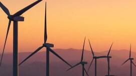 Wind turbines at sunset