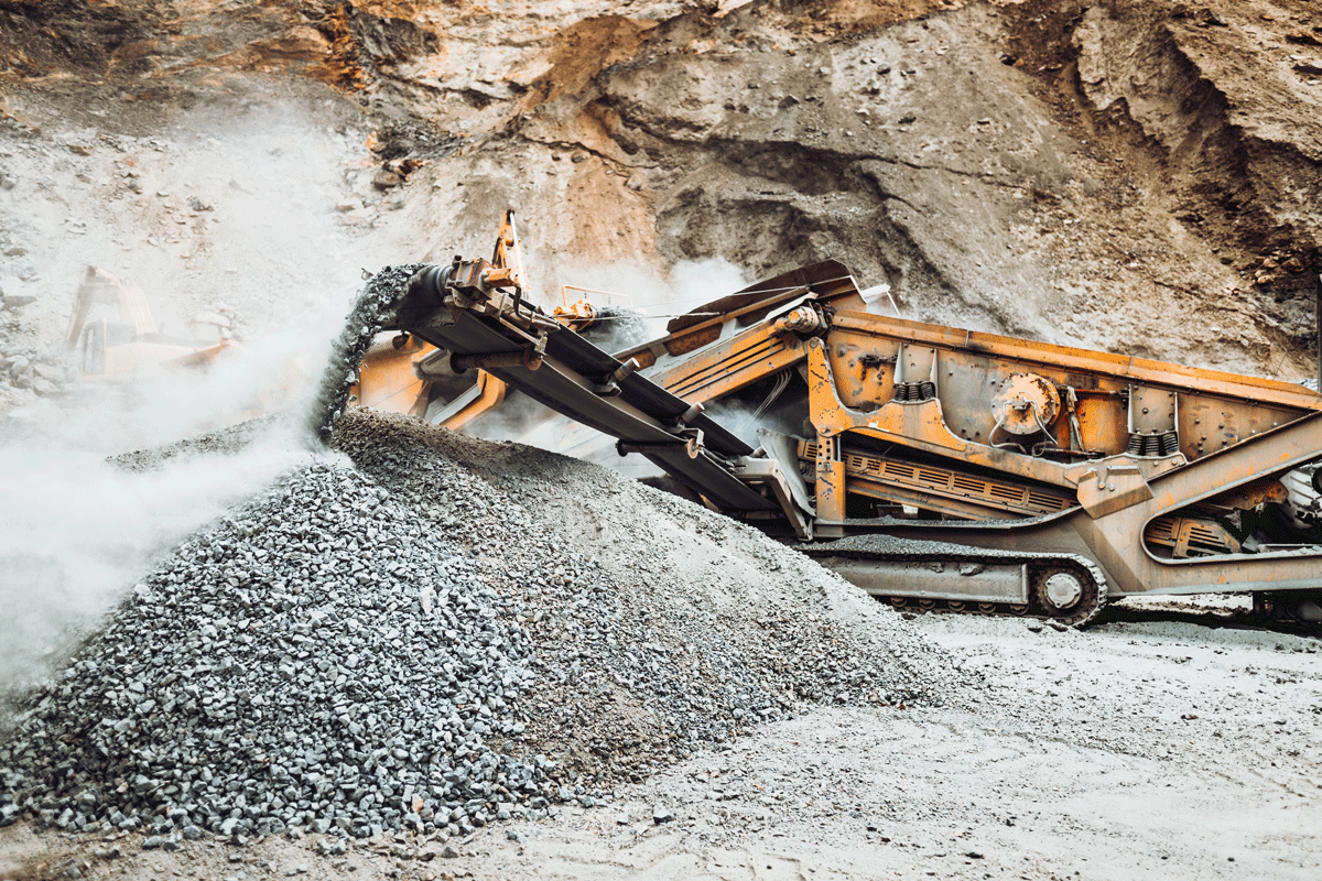 Mobile impact crusher in action in a quarry