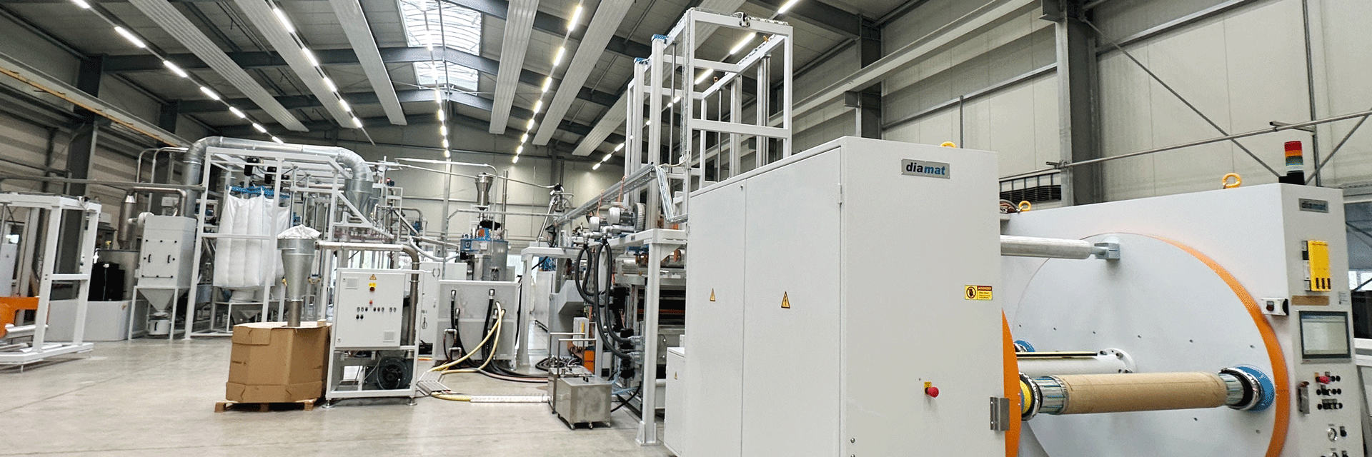 The machine hall at Diamat Maschinenbau in Dinkelsbühl (Bavaria) with plastic bottle recycling machines